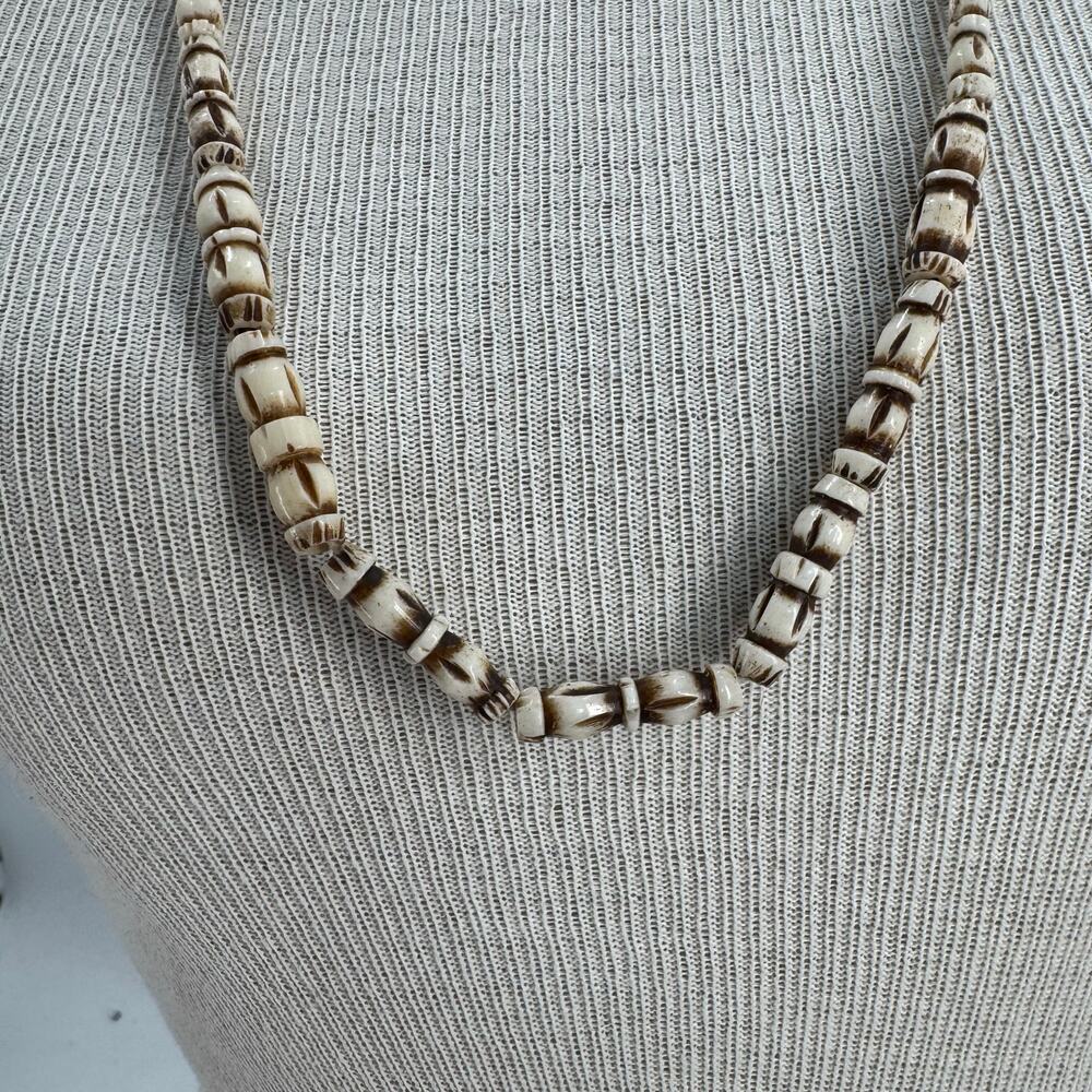 Carved bone necklace